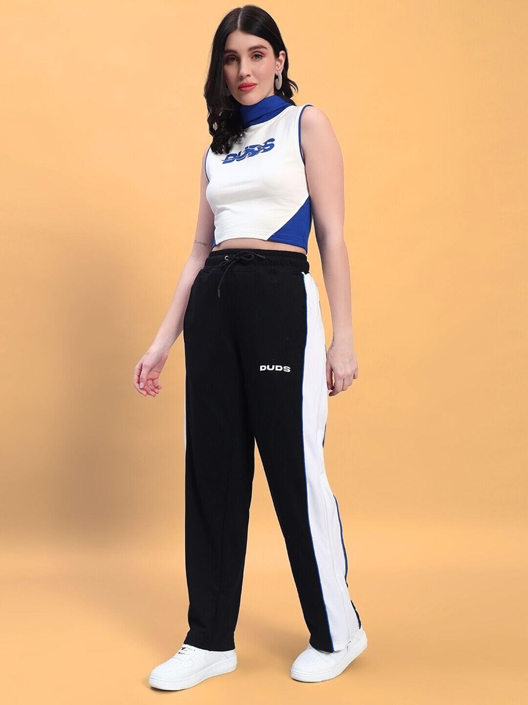 Woman modeling WOMEN'S MYSKY CO-ORD SET WHITE ROYAL BLUE with sporty and modern design, featuring white and royal blue accents.