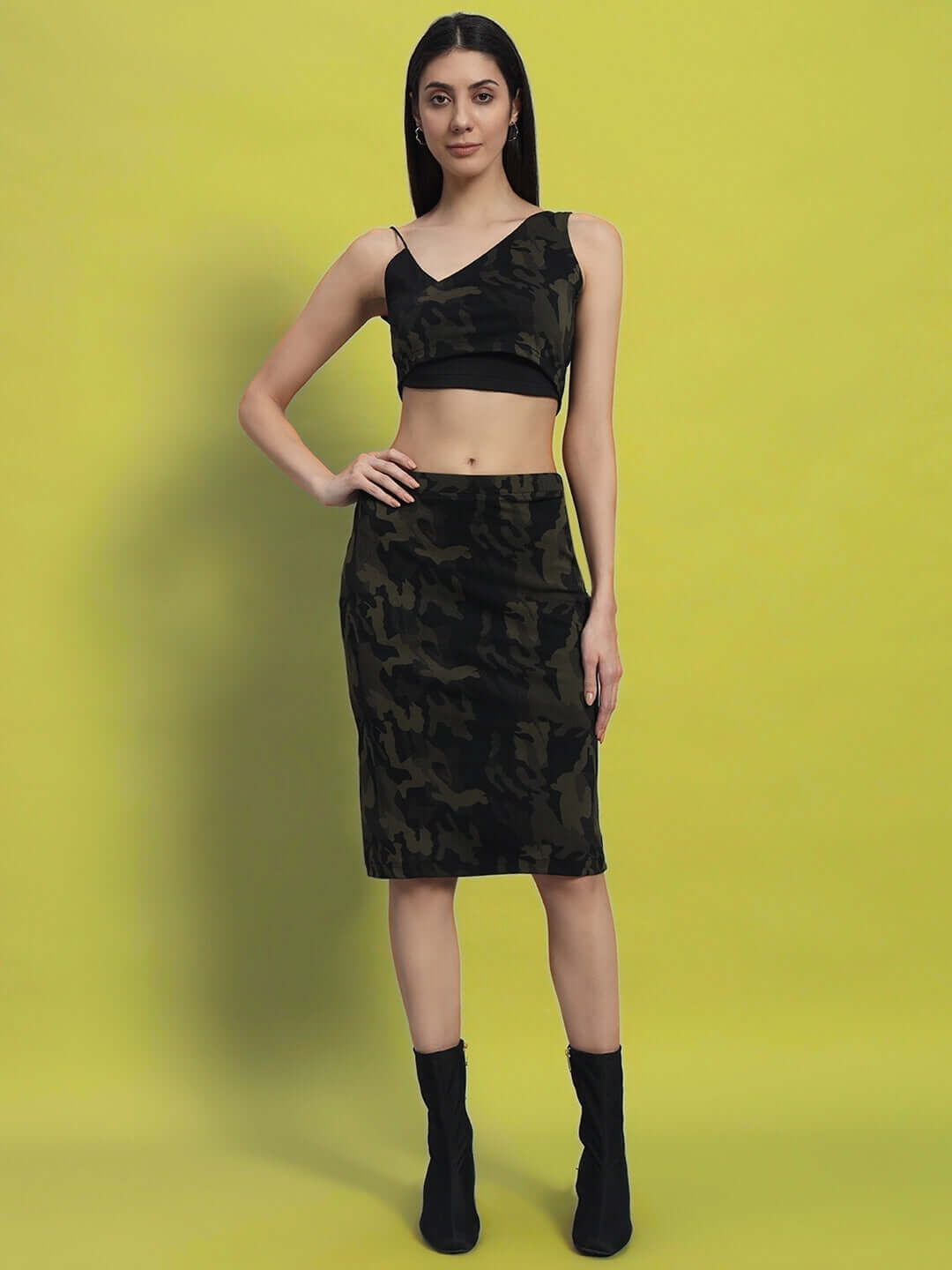 Model wearing WOMEN'S NAIROBI CO-ORD SET CAMO GREEN from WEAR DUDS, showcasing bold streetwear with camo-inspired design.