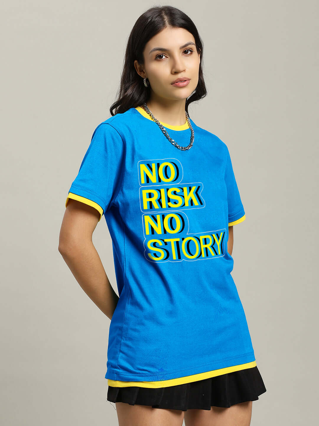 Alt Tag: Woman wearing blue 'No Risk No Story' t-shirt with yellow accents, made of 100% cotton heavy gauge fabric, India origin.