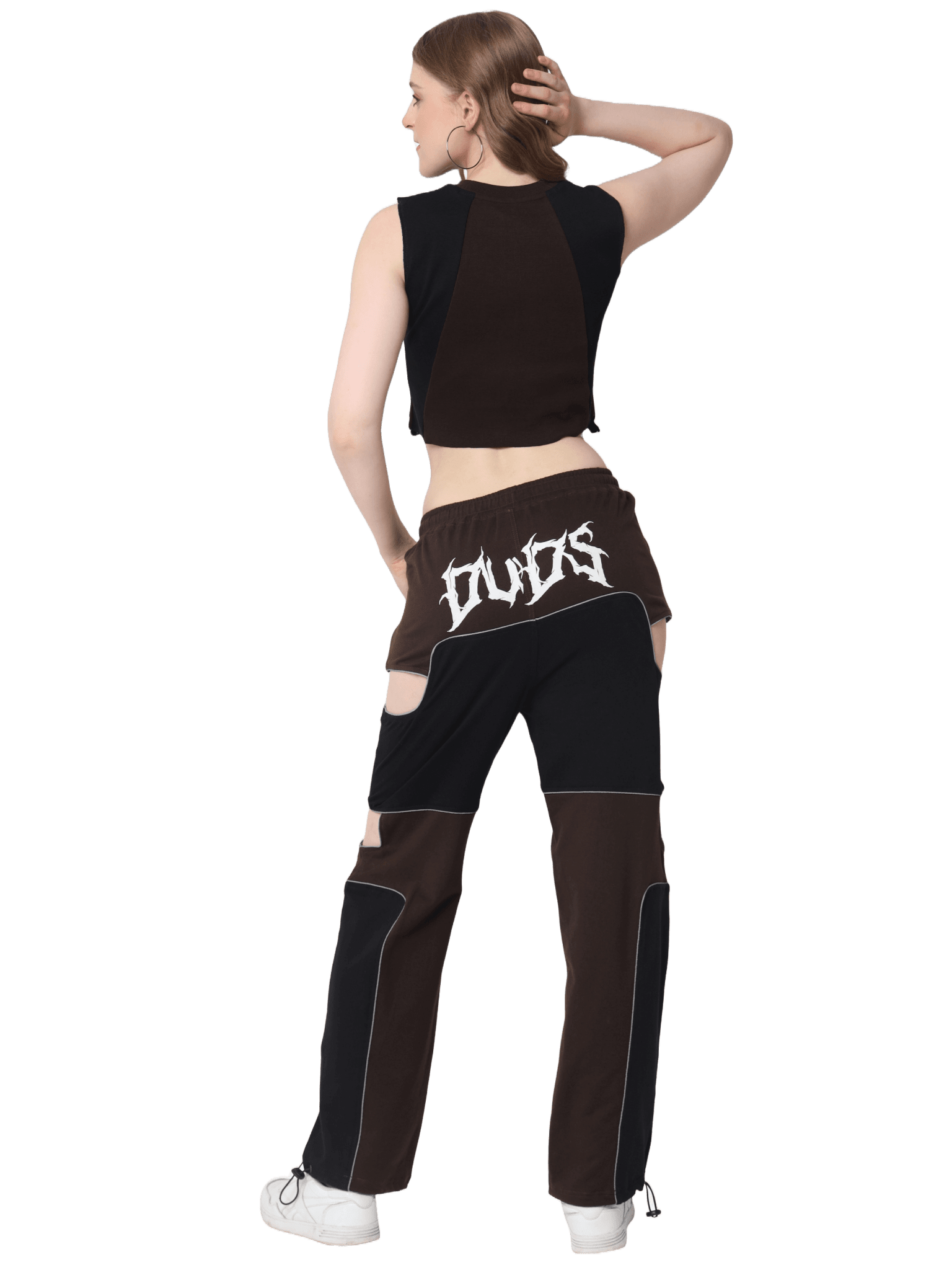 Back view of model in WOMEN'S ODDY COTTON CO-ORD SET BROWN, showcasing the stylish and minimalist design.