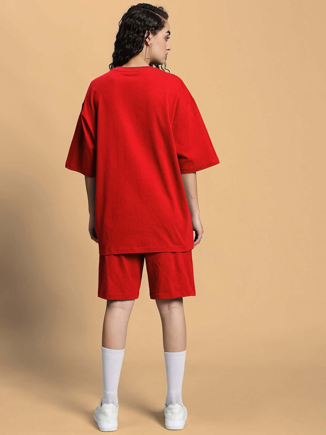 Rear view of WOMEN'S OUTLOOK SUMMER CO-ORD SHORTS SET RED, featuring a relaxed-fit t-shirt and shorts in vibrant red.