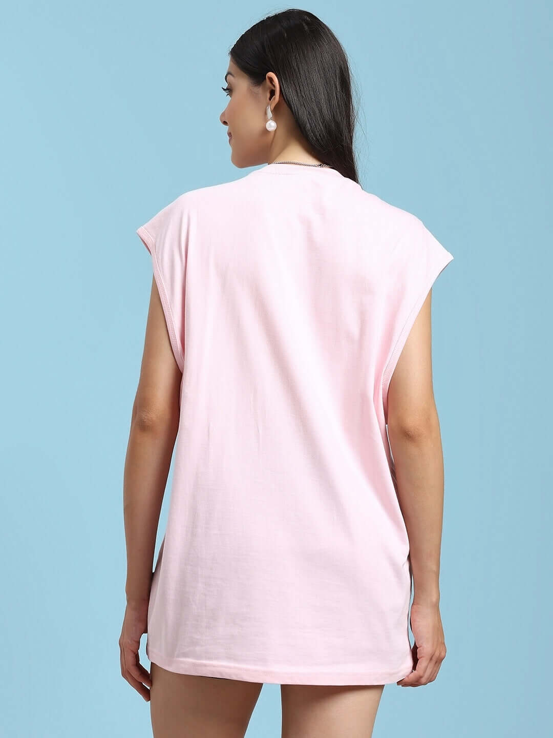 Back view of a woman wearing a pink Panther printed t-shirt with customizable size options, shown against a blue background.
