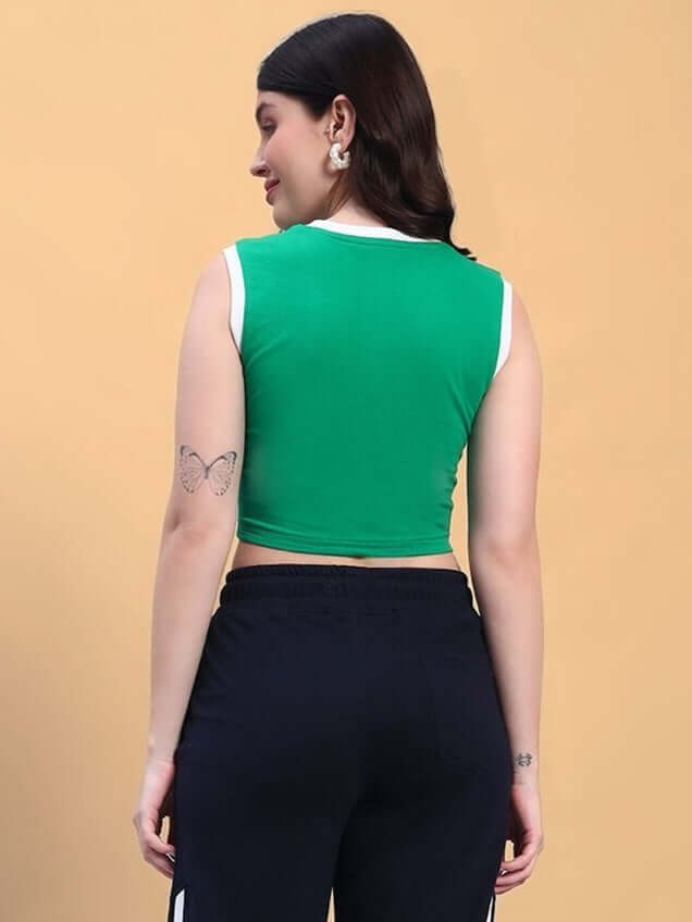 Back view of a woman wearing a green and white women's player crop-top, made of 100% cotton premium heavy gauge fabric, 240 GSM bio-washed.