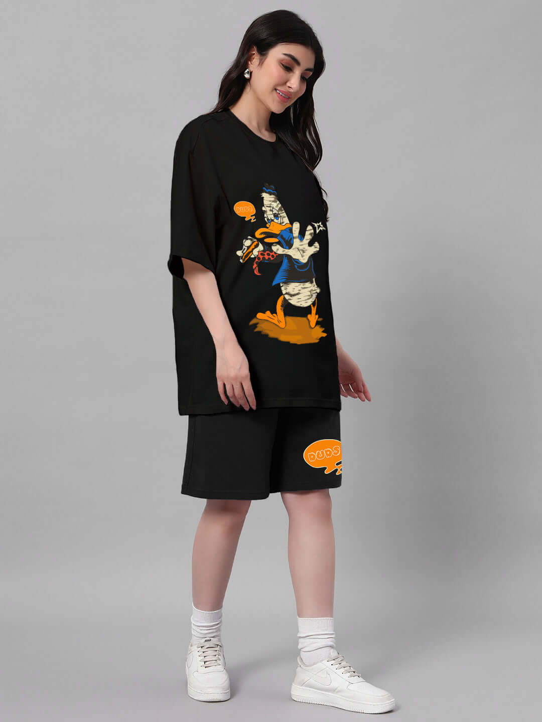 Model wearing Women's Quack Off Co-ord Set in black premium cotton fabric with graphic print and comfortable fit, showcasing stylish design.