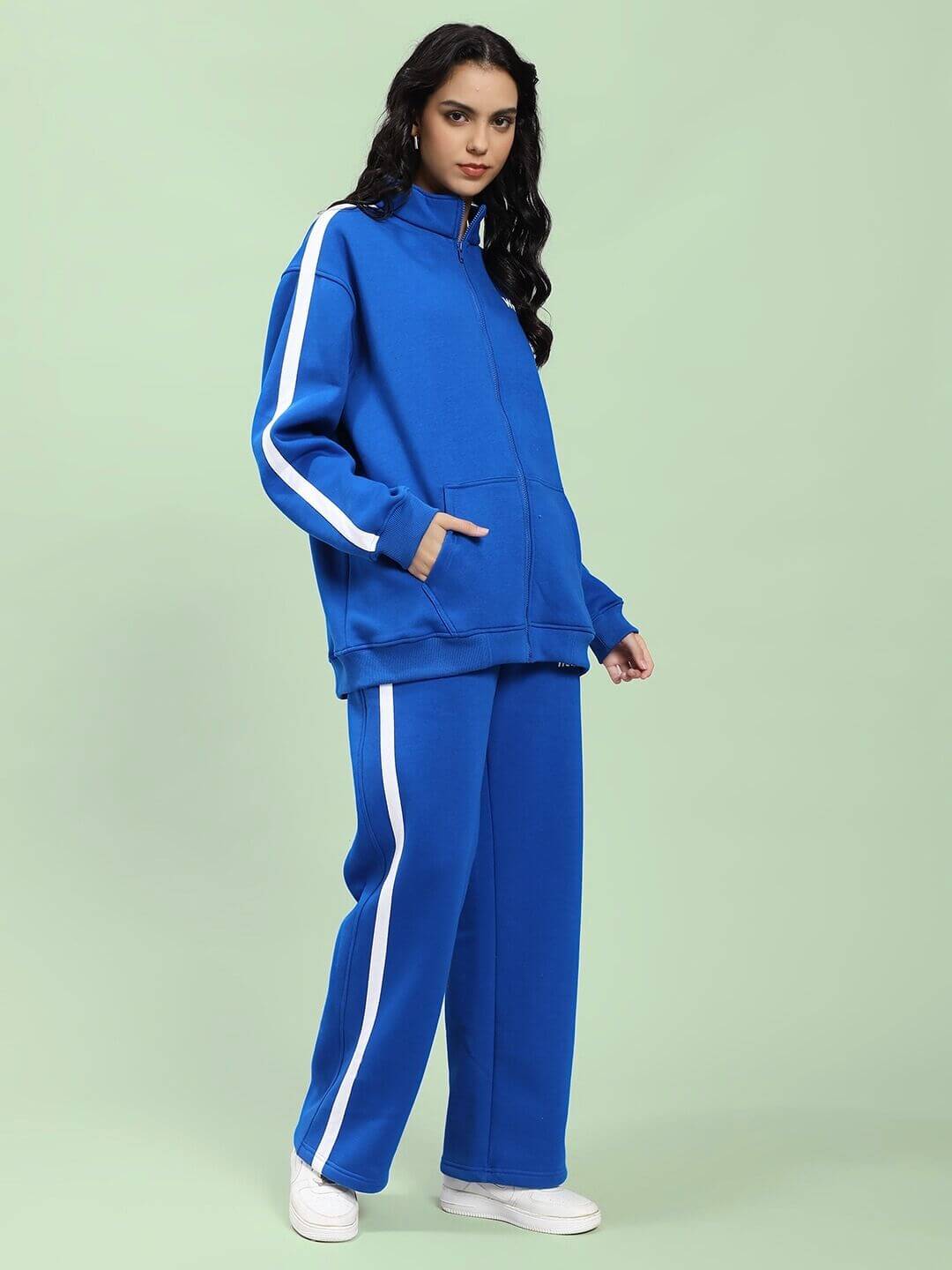 Woman wearing WOMEN RAPID STRIDE ROYAL BLUE COTTON FLEECE CO-ORD SET with stylish design.