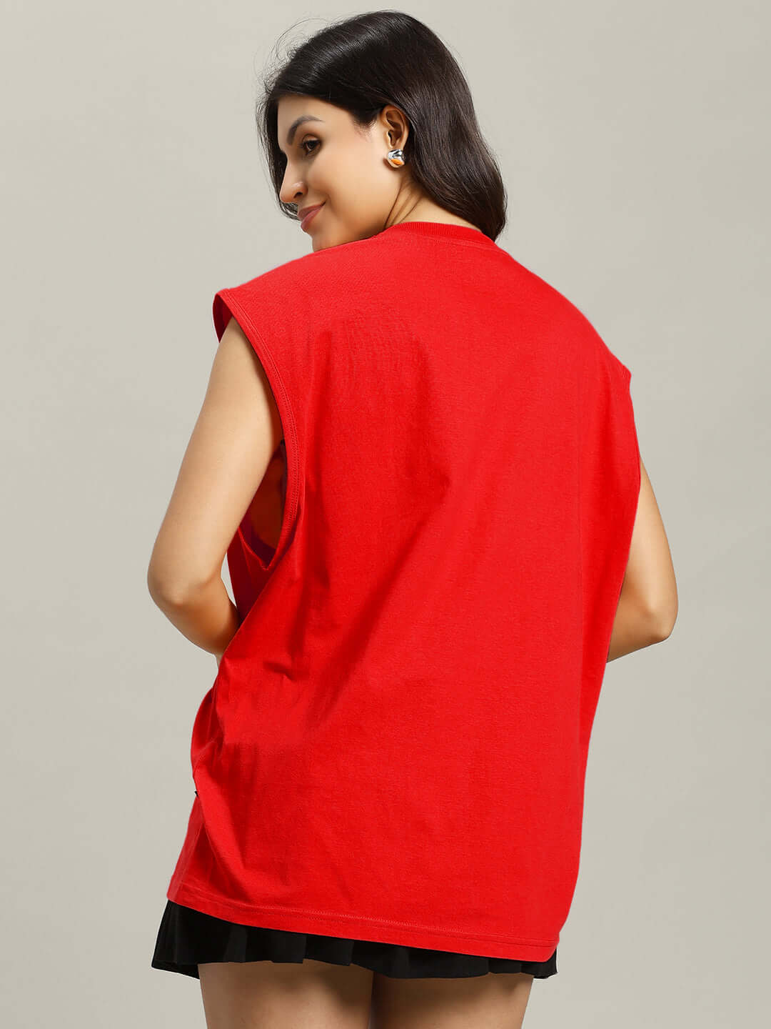 Back view of woman wearing red Everything Fine Gym T-shirt, showcasing loose fit and casual style. Perfect for custom fit orders.