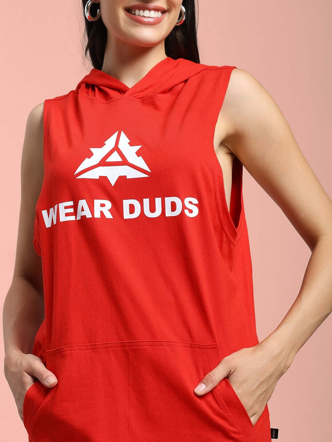 Woman wearing red CYBRAN gym hooded T-shirt, showcasing 'Wear Duds' logo, highlighting fit and comfort for active lifestyle.
