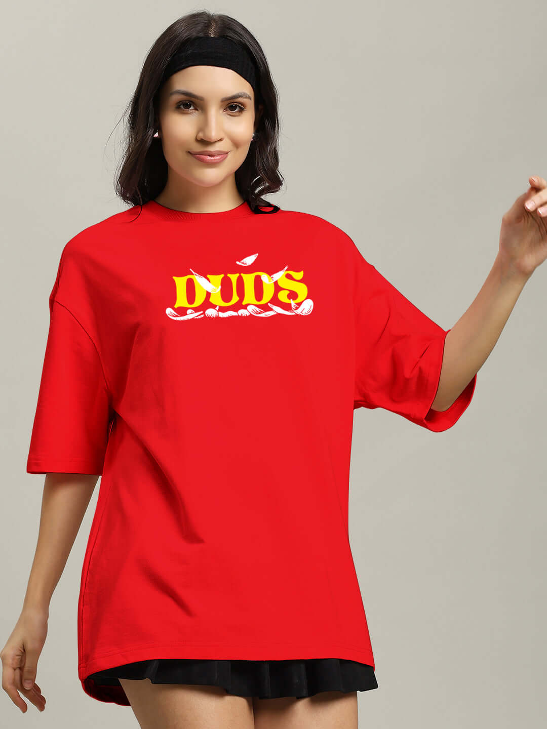 Women's red oversized t-shirt with 'Stay Happy' print, made from premium cotton fabric; comfortable and stylish for casual wear.