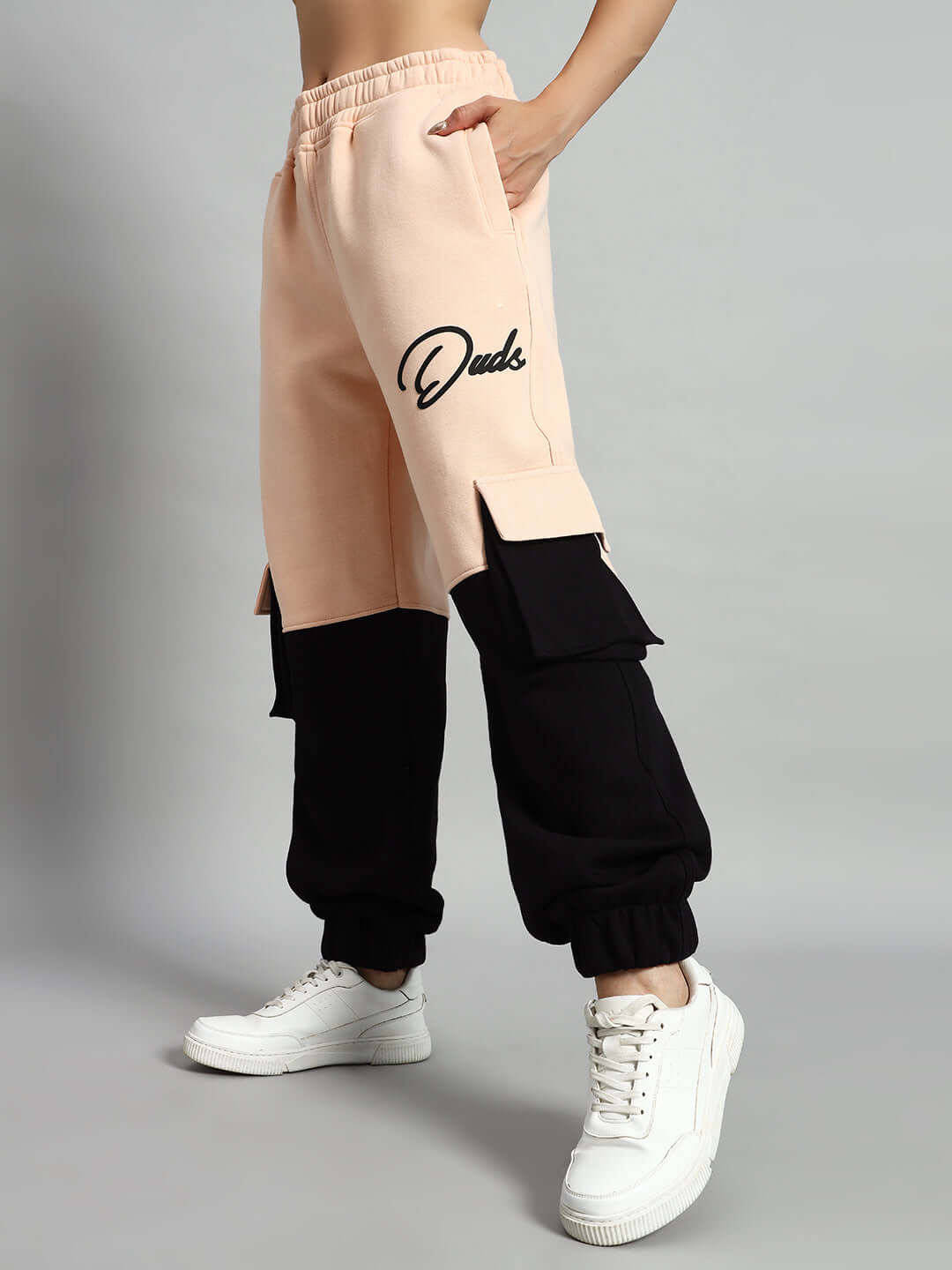 WOMEN REGIMENT FLEECE PANT BEIGE BLACK featuring urban style with premium fleece, ribbed hems, and adjustable waistband.