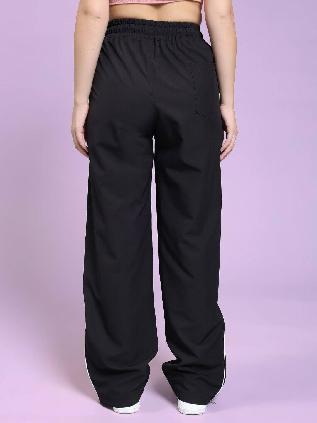 Back view of WOMEN PERFACT RELAXED-FIT JOGGER BLACK showcasing comfortable fit and premium fabric