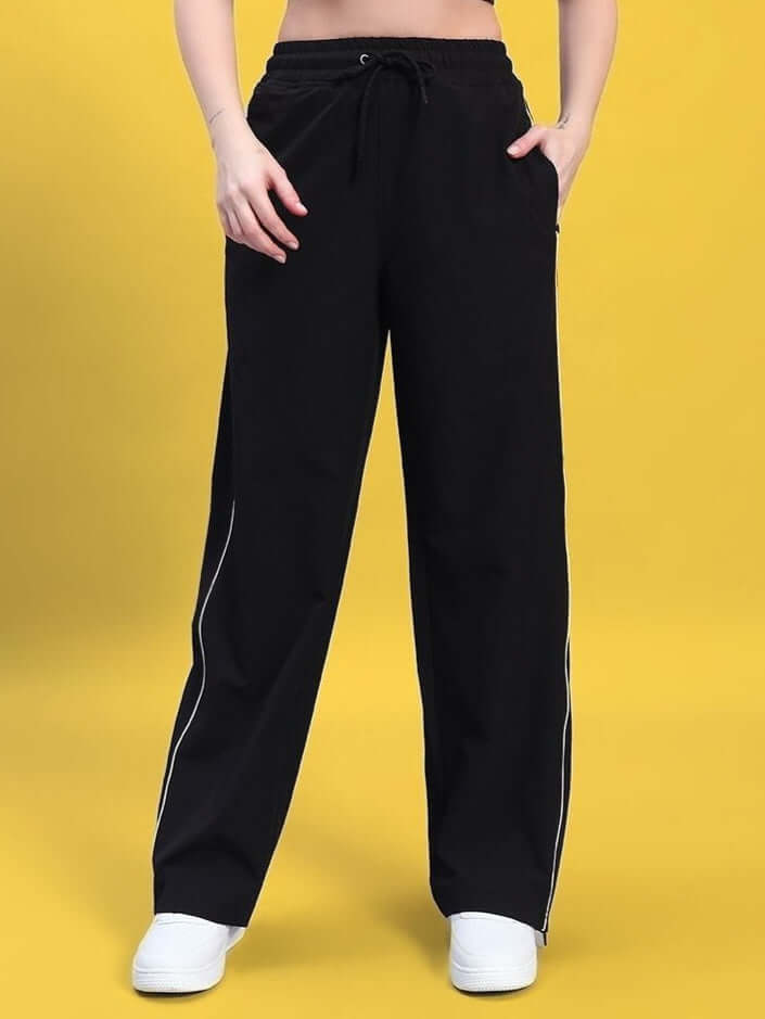 Women's black relaxed-fit joggers with drawstring waist, showcasing comfort and style for casual wear.