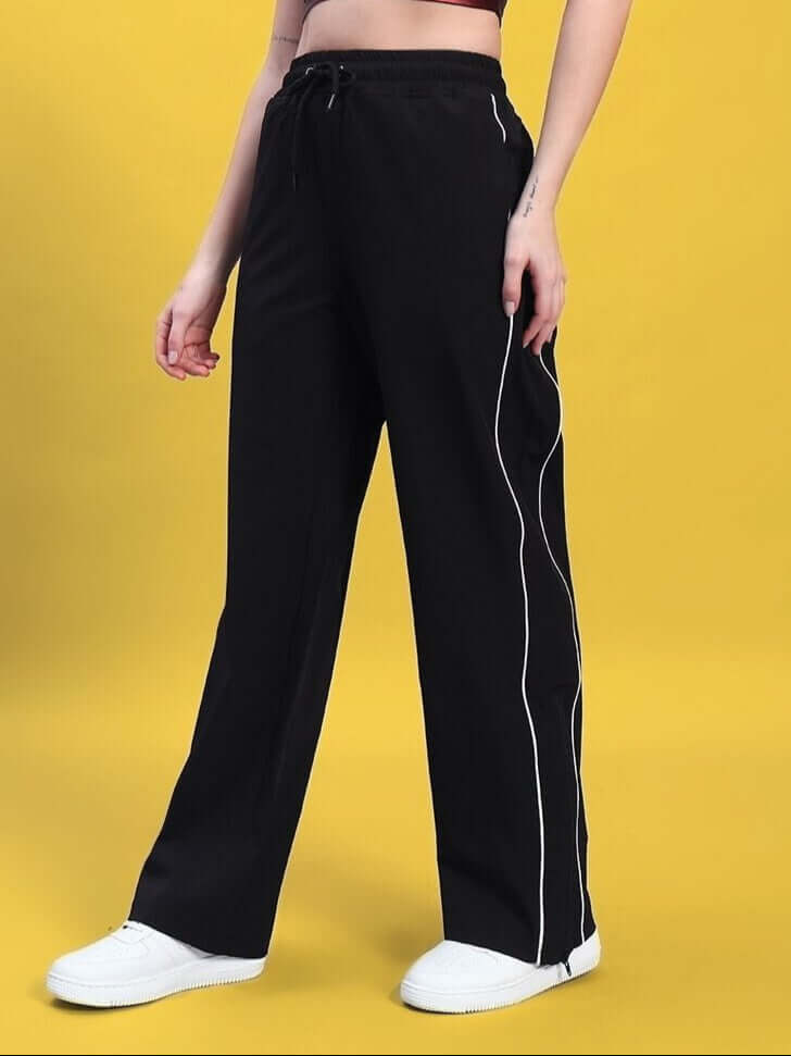 Women's black relaxed-fit joggers with customizable size option, featuring a stylish design ideal for comfort and fashion.