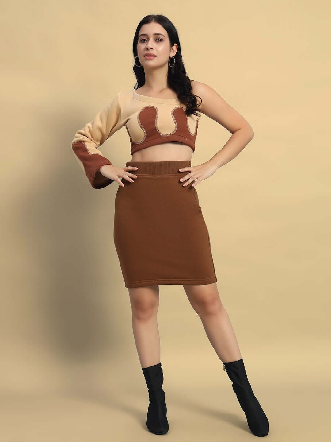 Model wearing WOMEN'S RETRO CO-ORD SET BEIGE BROWN made from cotton fleece fabric.