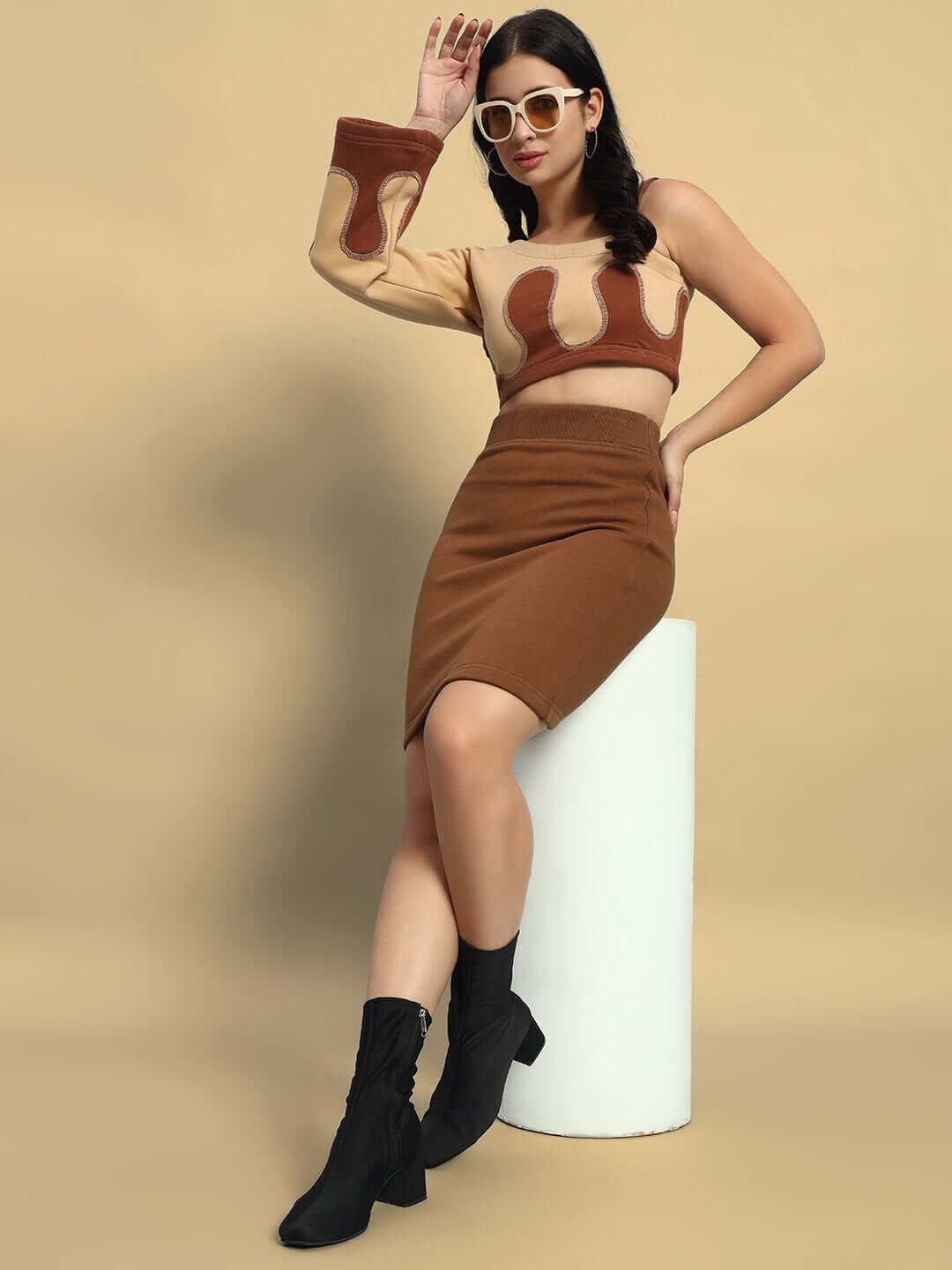 Model wearing WOMEN'S RETRO CO-ORD SET BEIGE BROWN, featuring a stylish cotton fleece design, showcasing timeless elegance and comfort.