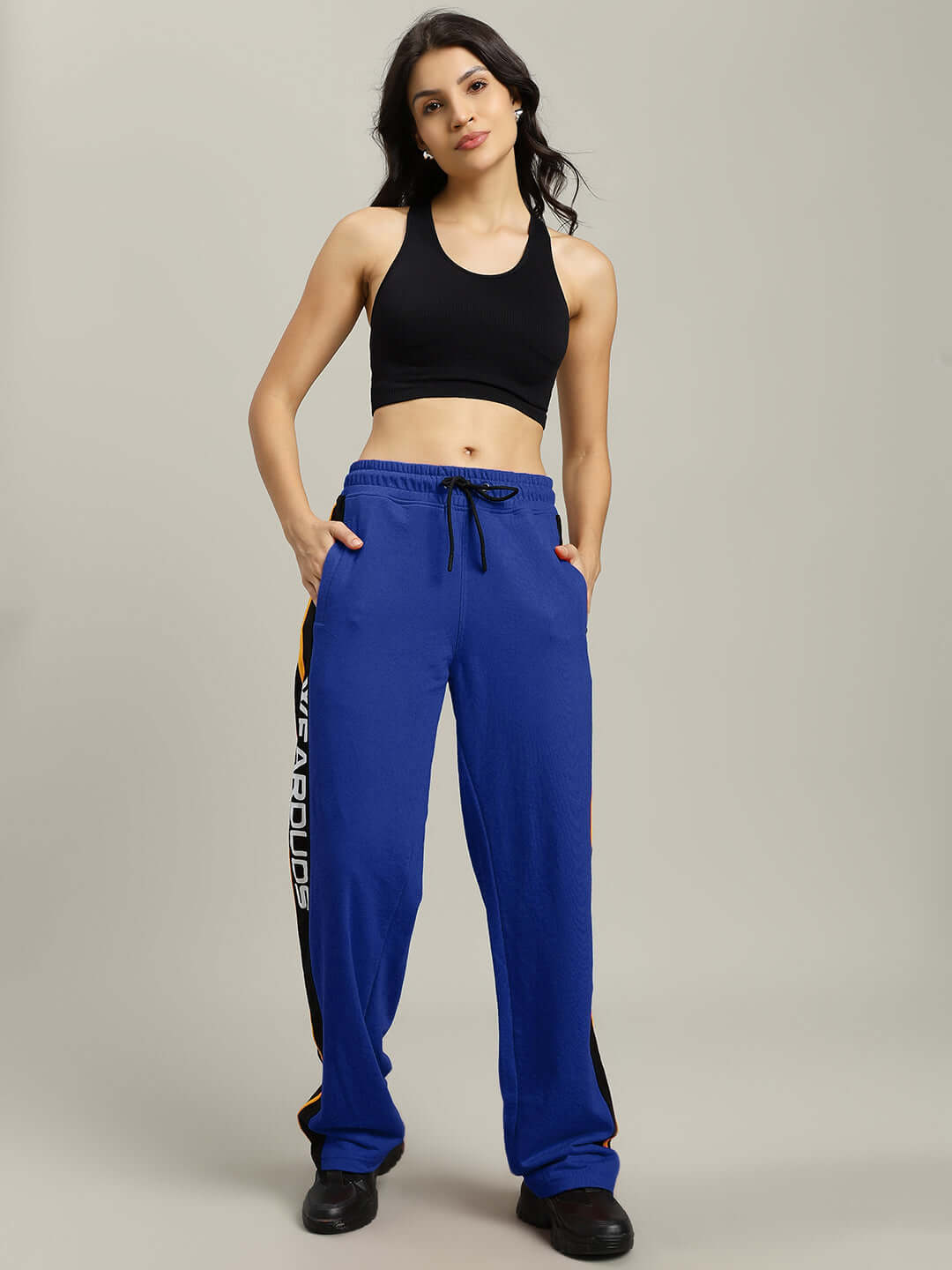 Woman wearing WOMENS ROGER RELAXED-FIT JOGGERS BLUE, showcasing soft, breathable fabric for casual style and comfort.