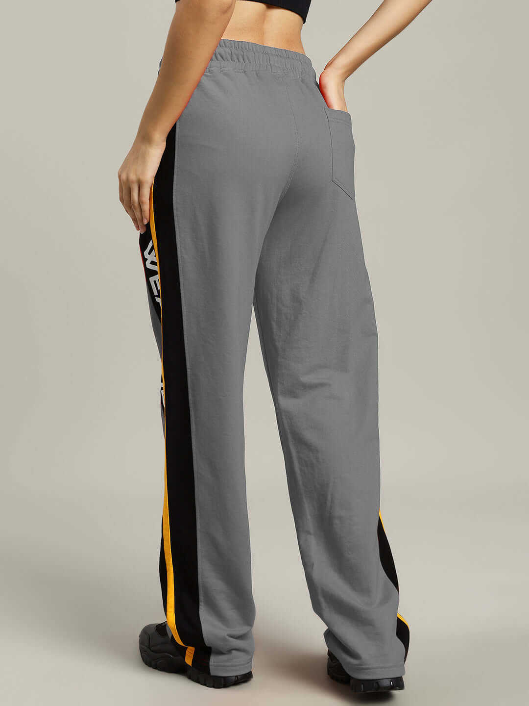 Back view of Women's Roger Relaxed-Fit Joggers in grey with side stripe detail, made by DUDS, available in custom fit options.