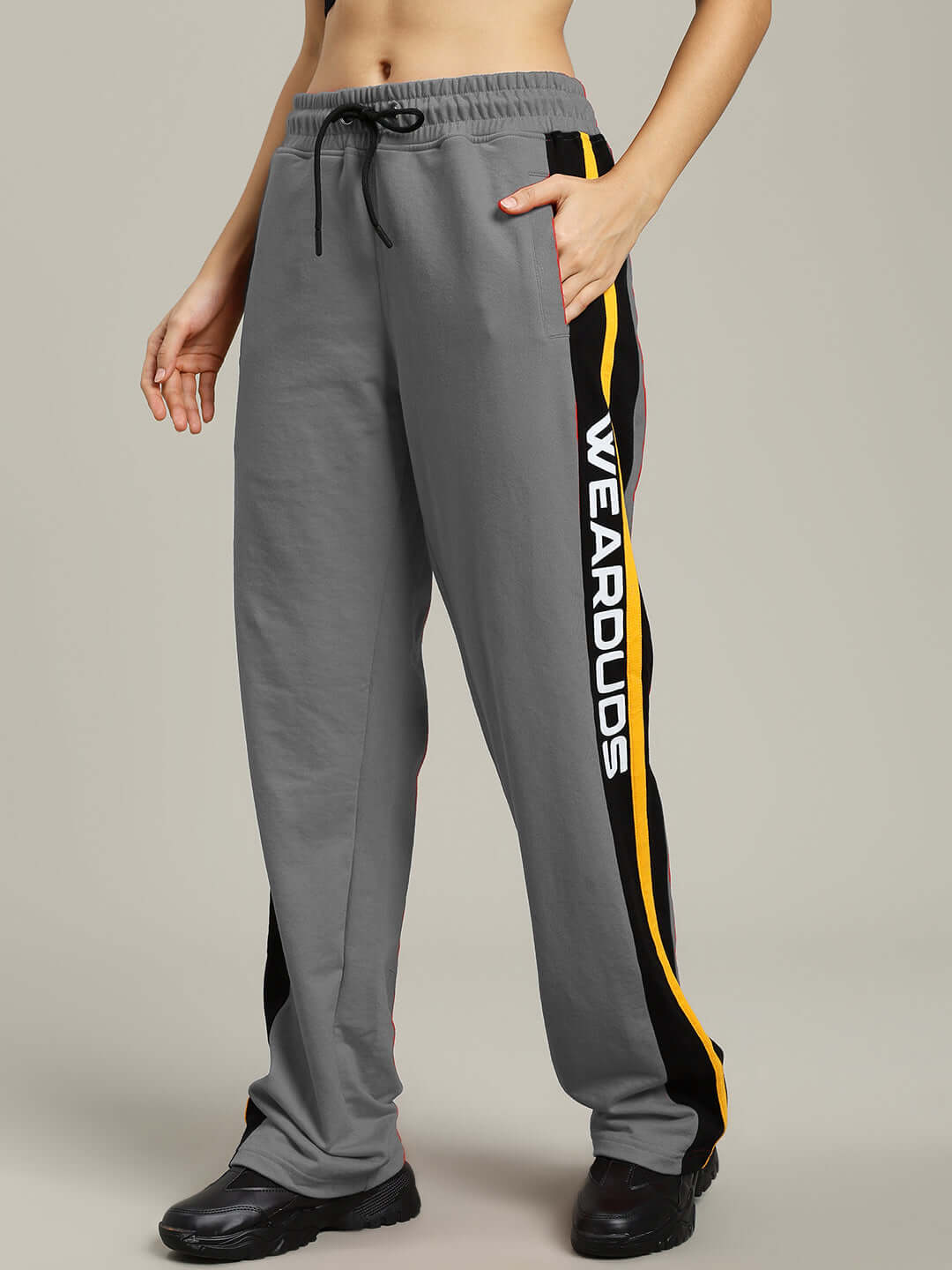 Women's grey relaxed-fit joggers by DUDS with customizable size options and stylish side stripe detailing.