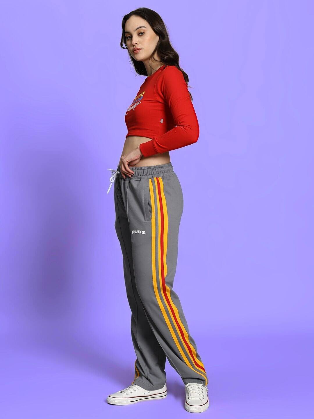Model wearing Women's Rossi Racing Print Co-Ord Set in red and grey with elasticated waistband, featuring relaxed joggers and a premium cotton top.