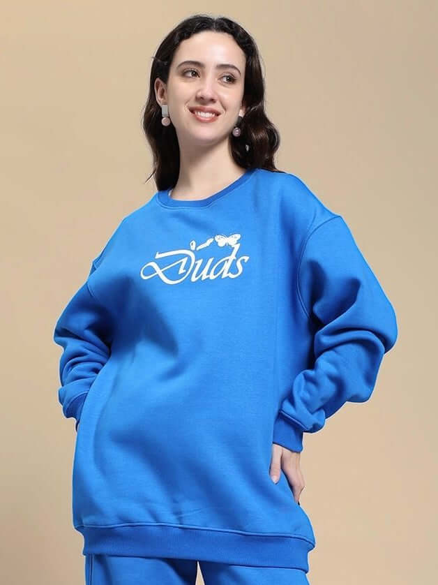 Woman wearing WOMEN NATURE LINK FLEECE SWEATSHIRT ROYAL BLUE in cozy style