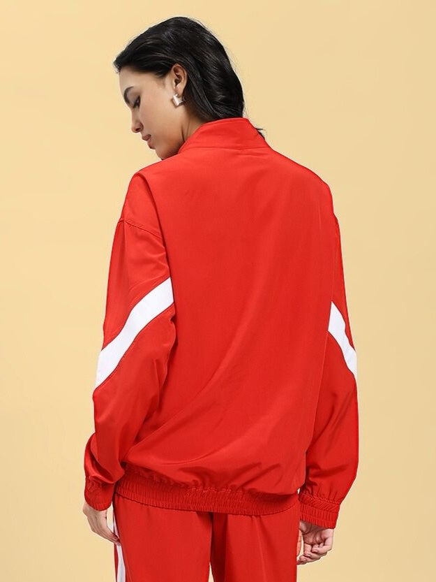 Woman wearing WOMEN'S ROYAL COMFORT RELAXED FIT JACKET RED from behind, showcasing luxurious and sophisticated style.
