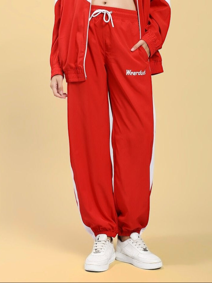 WOMEN'S ROYAL COMFORT RELAXED FIT JOGGER RED displayed on model, showcasing bold red color and relaxed fit style.