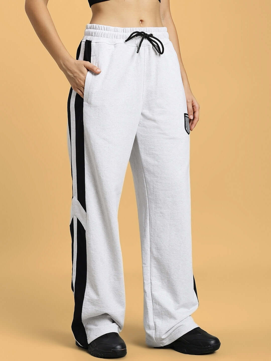 Women's Royalson Joggers Melange-Grey, comfortable fit joggers featured in color close-up, premium quality fabric, perfect for casual wear.