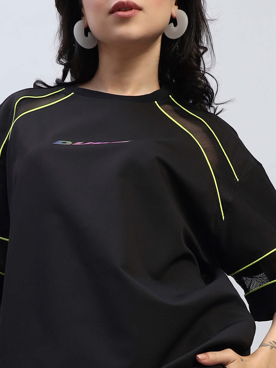 Women's Salvo Reflector Co-Ord Set in black premium sports polyester fabric, showcasing neon accents, ideal for stylish activewear.