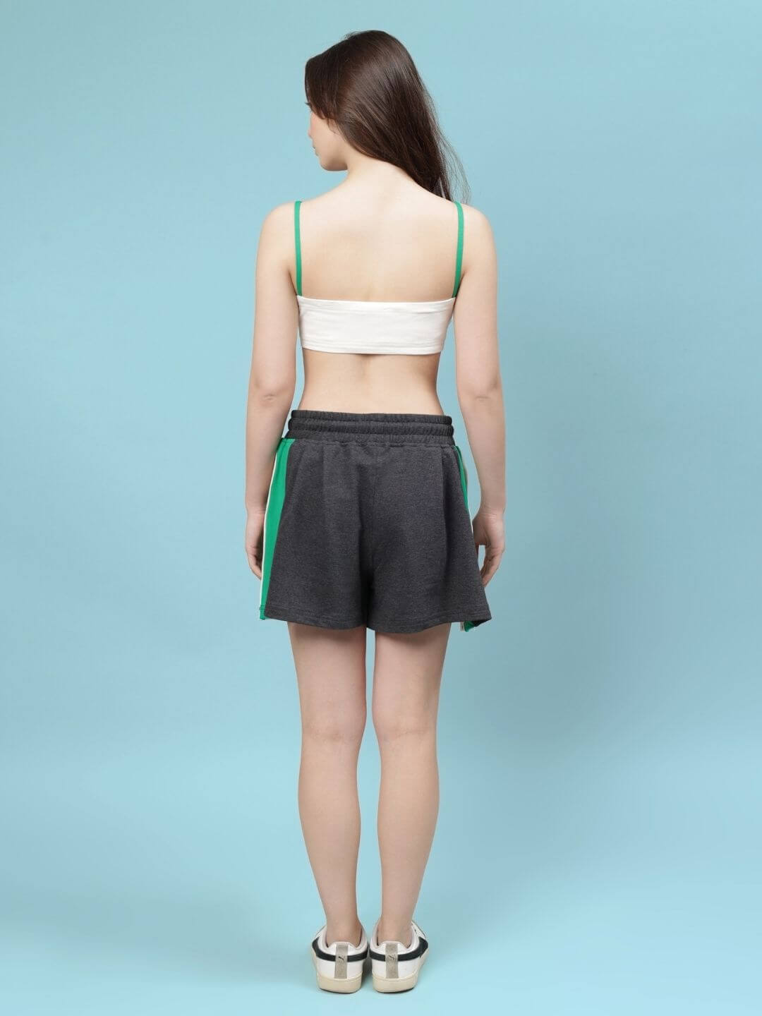 Back view of WOMEN'S SAMMIE CO-ORD SET OFF WHITE-DARK GREY, showcasing stylish shorts and a crop top in soft, breathable fabric.