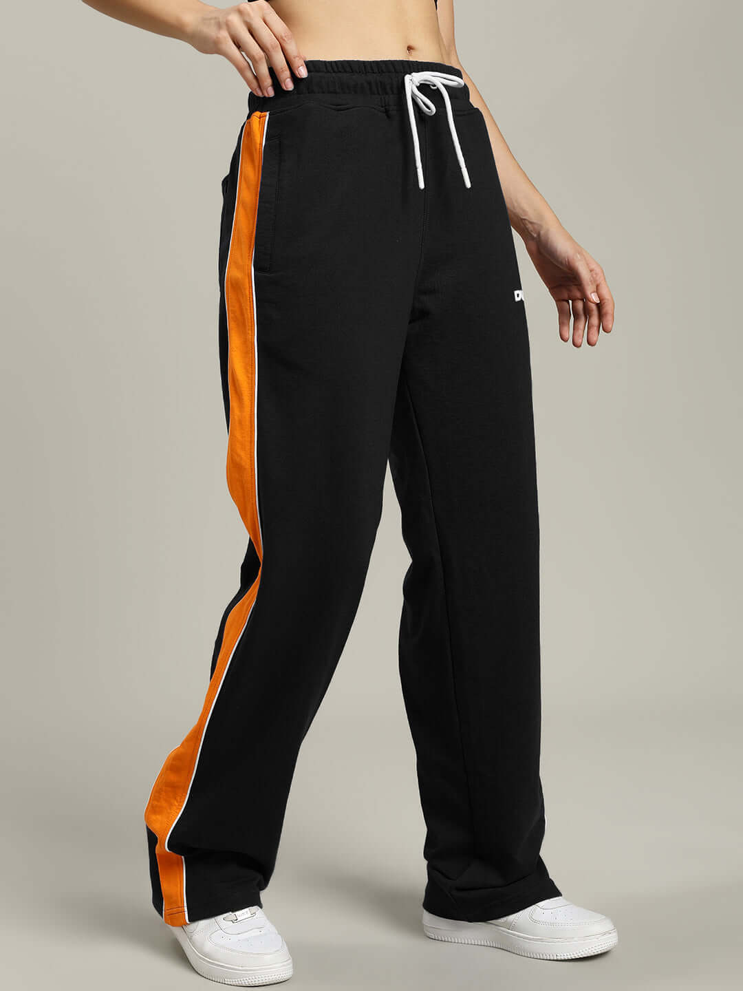 WOMENS SANFORD STRIPE JOGGERS BLACK with side stripes, offering comfort and style with a relaxed fit for casual wear.