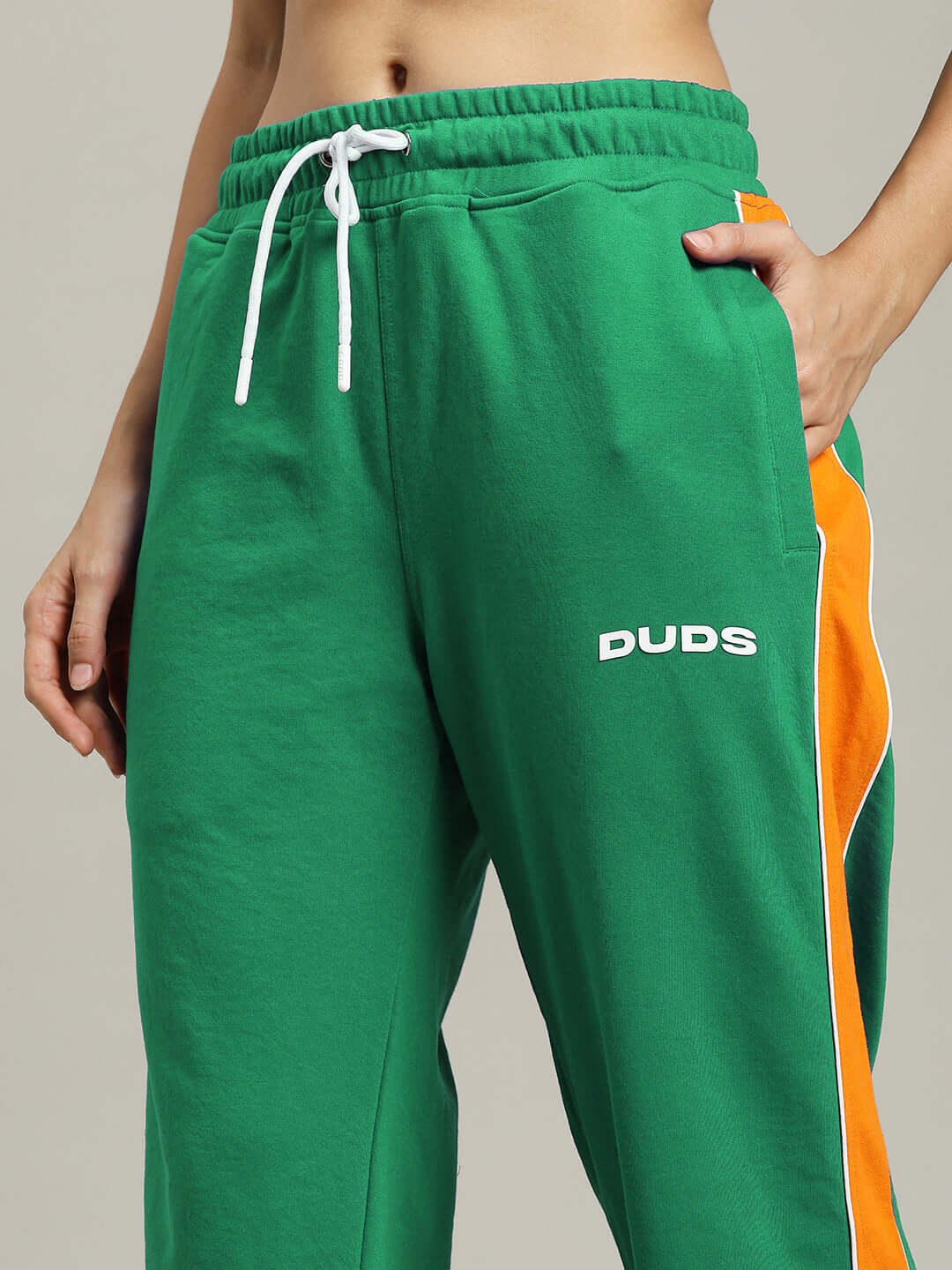 WOMENS SANFORD STRIPE JOGGERS GREEN with orange side stripe, featuring a casual fit and drawstring waist for comfort.