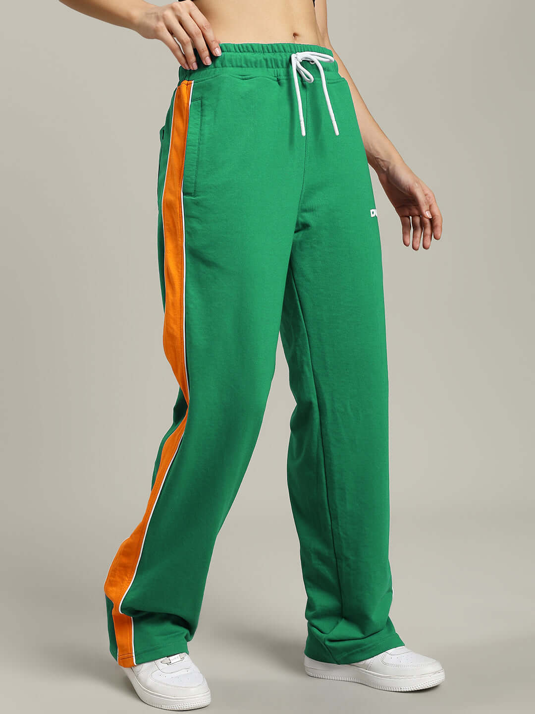 WOMENS SANFORD STRIPE JOGGERS GREEN with orange side stripes, breathable fabric, relaxed fit for stylish casual wear.