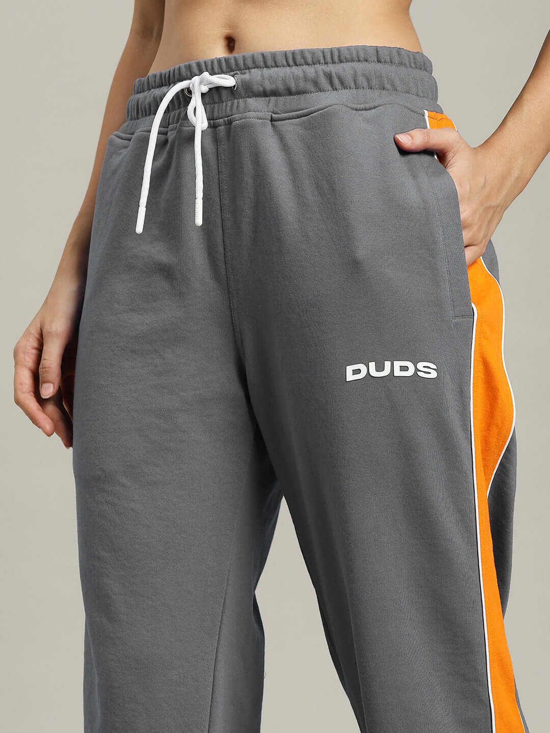 WOMENS SANFORD STRIPE JOGGERS GREY with orange side stripe detail, showcasing modern style and comfort.