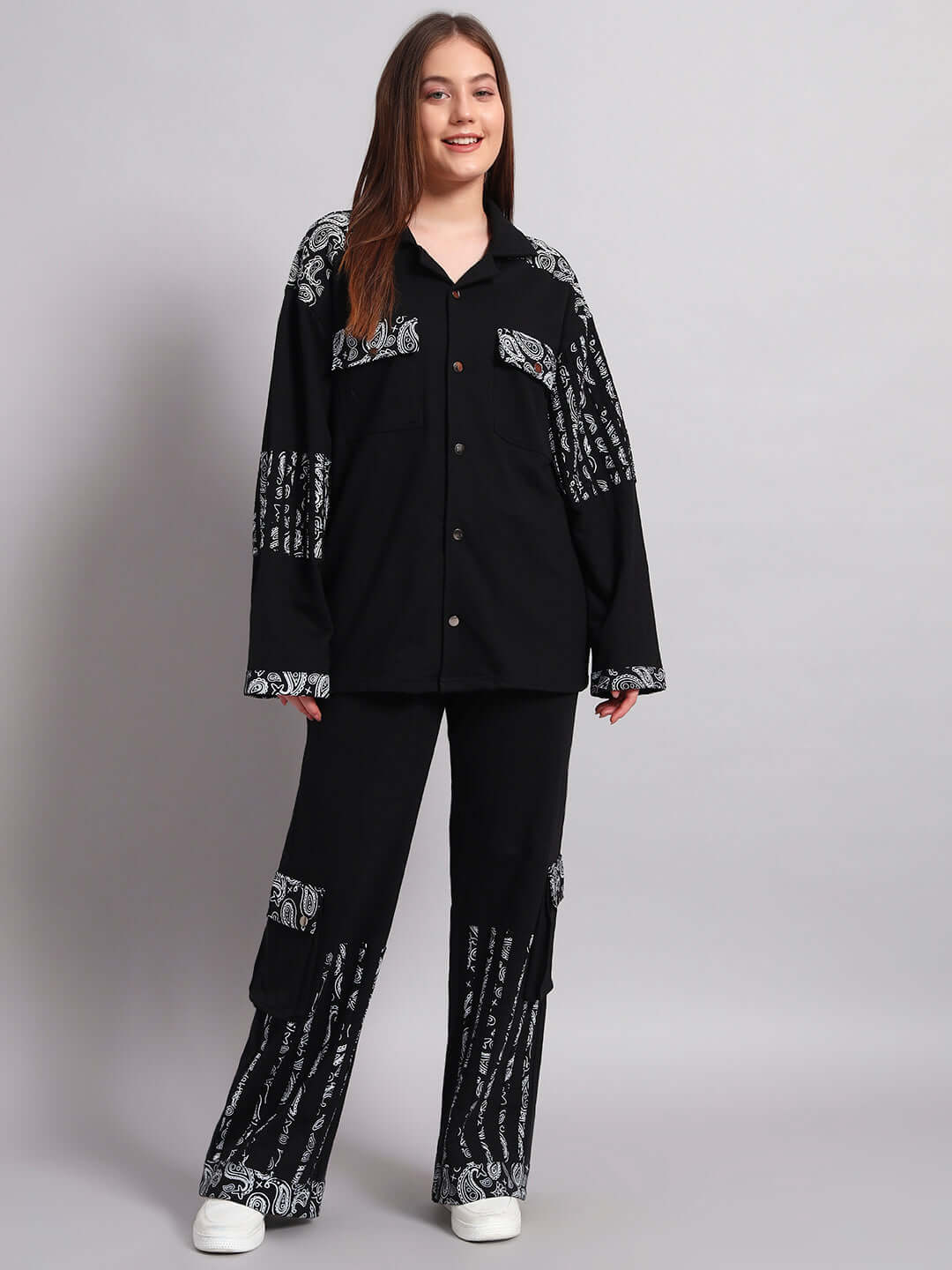 Model wearing women's black Sanganeri co-ord set made of 100% cotton terry fabric with traditional patterns, stylish and comfortable fit.