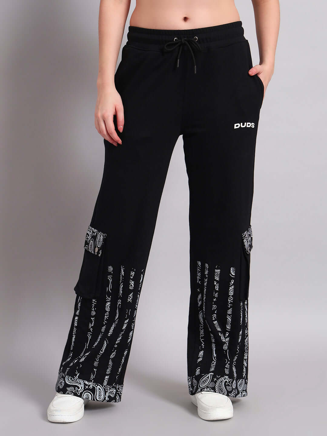 Woman wearing black Sanganeri co-ord set with printed details, showcasing premium cotton fabric and comfort fit.