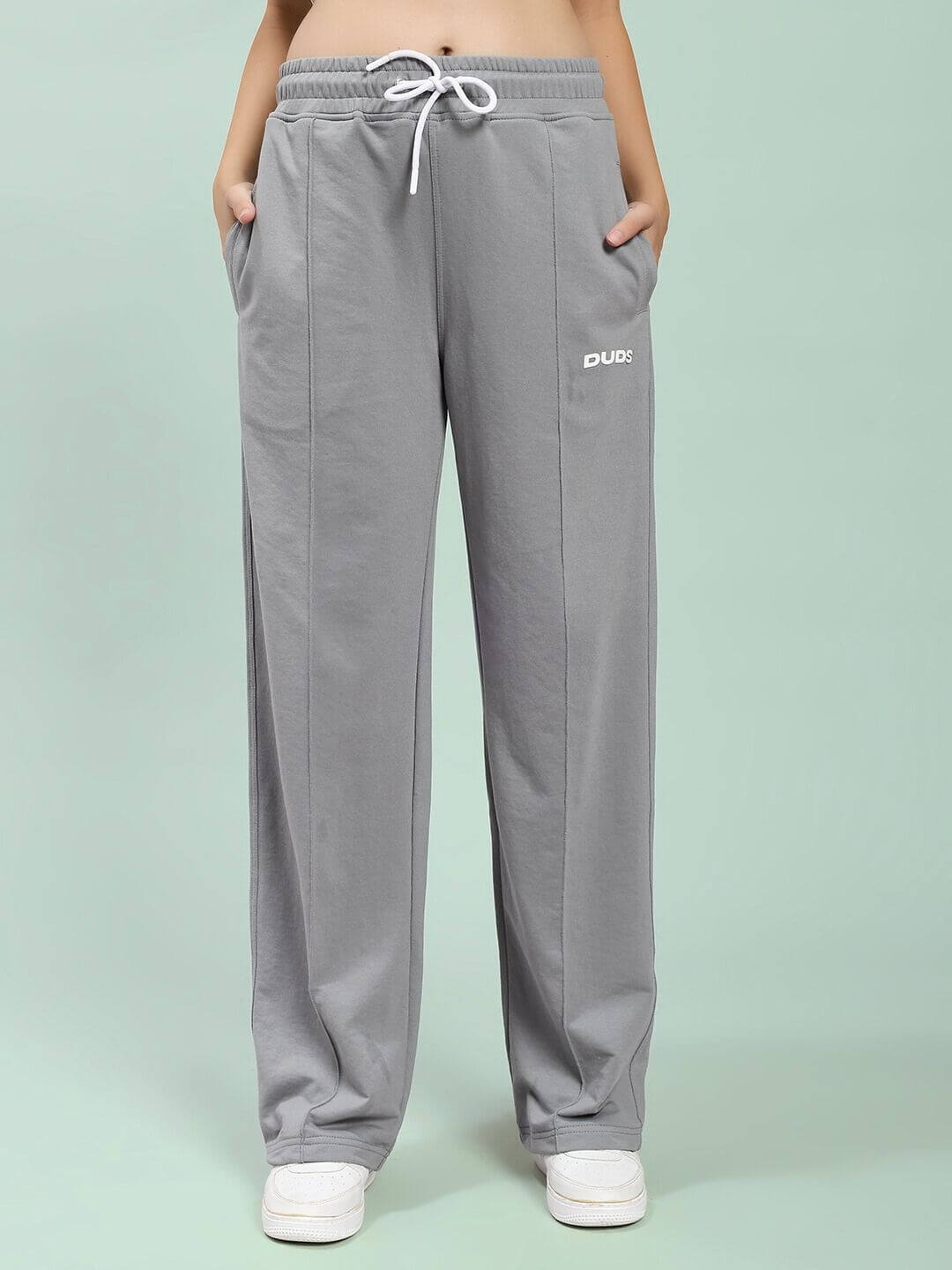 WOMEN SPIRAL RELAXED-FIT JOGGERS GREY worn by model, showcasing soft cotton-blend fabric and relaxed fit, perfect for comfort and style.