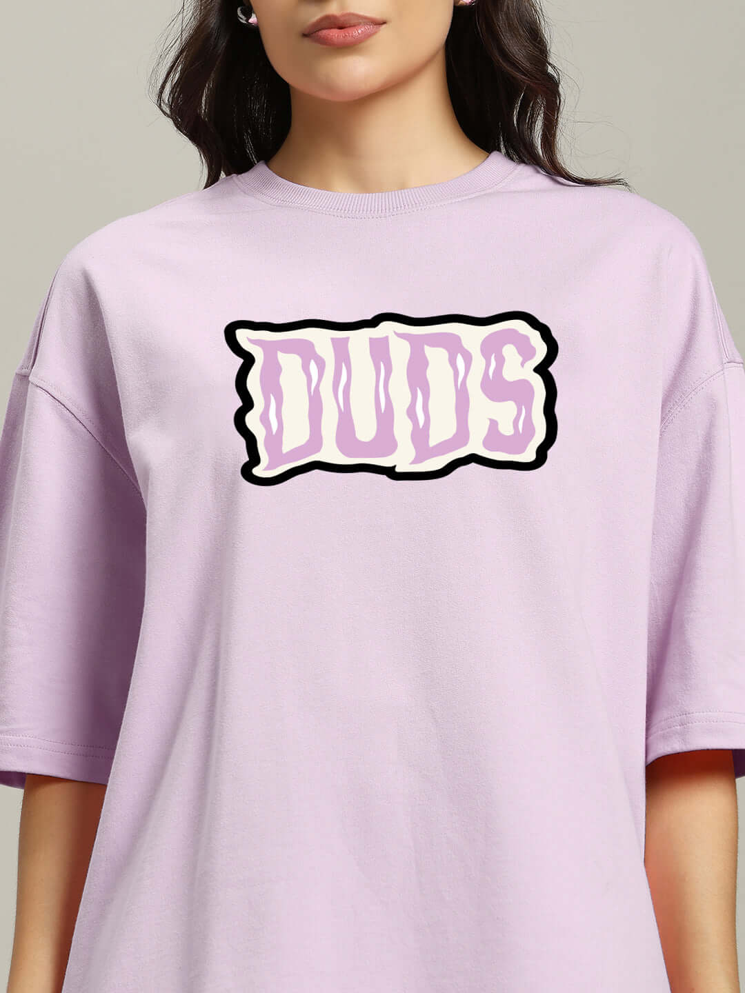 Women's lavender oversized t-shirt with 'Let's Get Spooky' design, made from premium cotton blend, displayed on a mannequin.