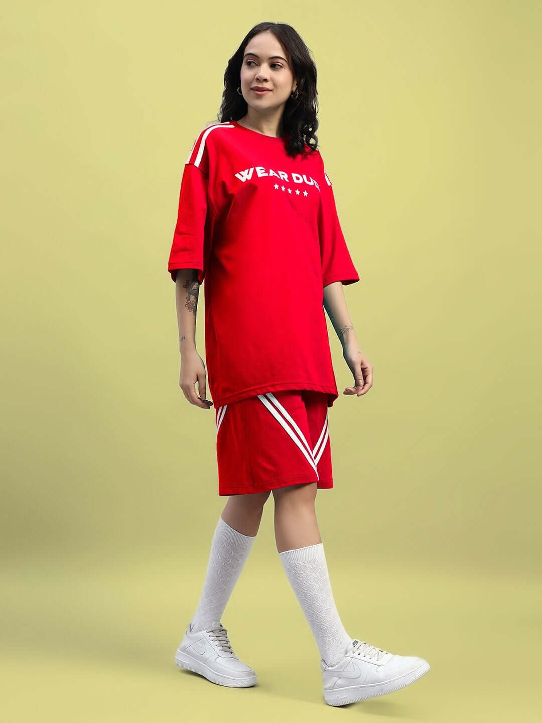 Women's Star Jumper Summer Co-ord Set in Red, featuring premium cotton fabric, perfect for casual wear, model standing against a light background.