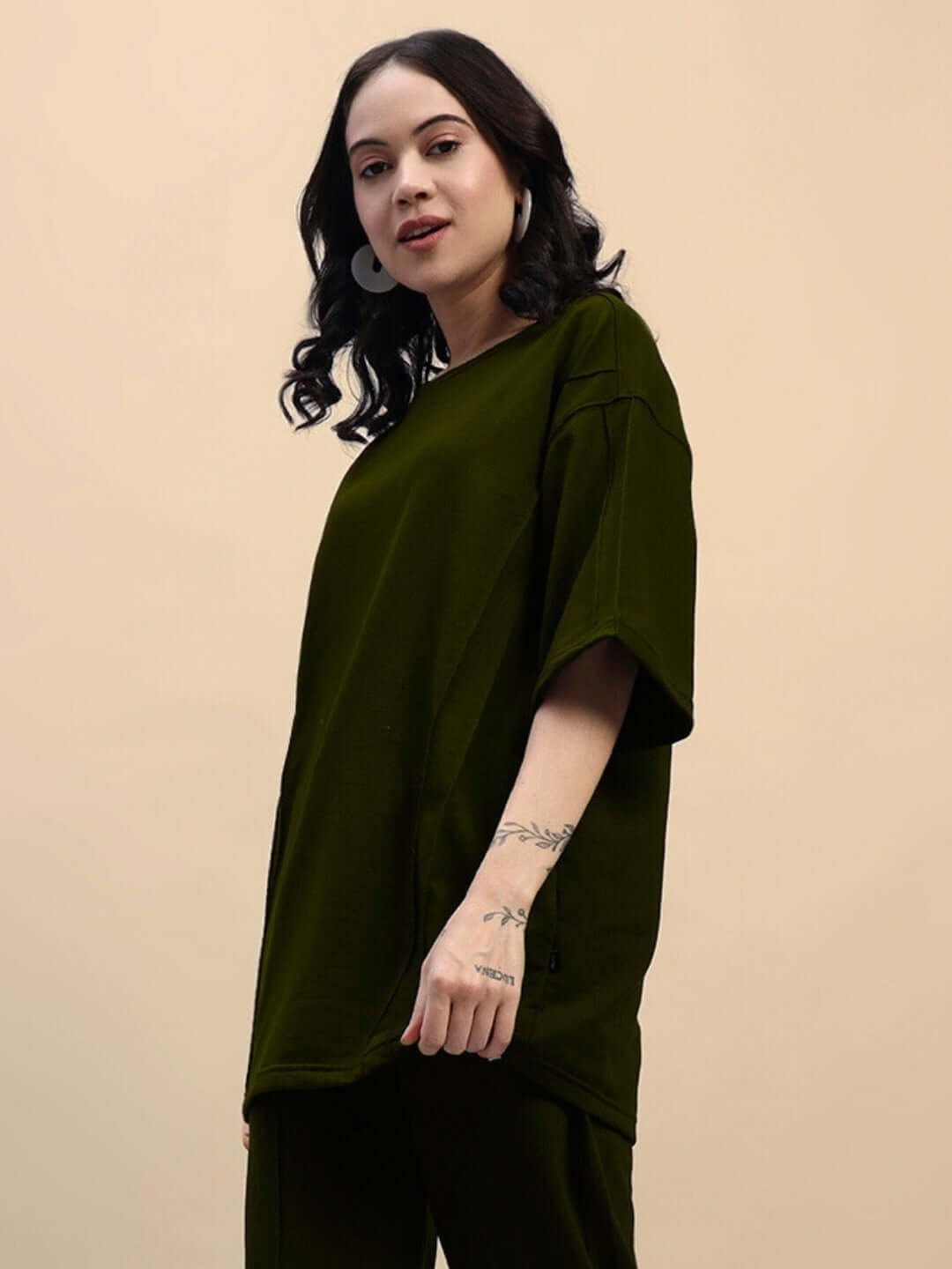 Olive Green Women's Superior Oversized T-Shirt, Premium Cotton French Terry, relaxed fit showcased on a model, made in India.