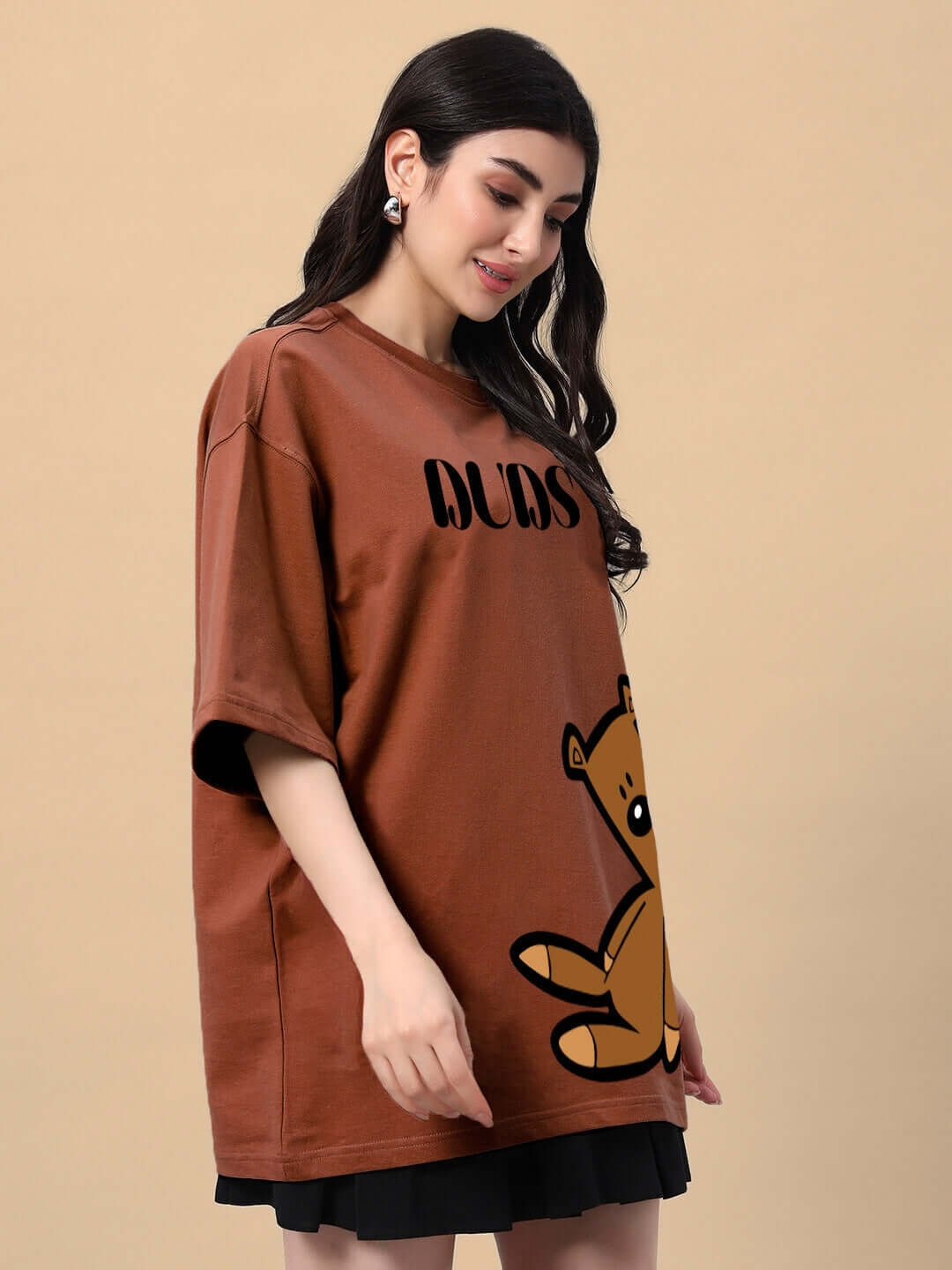 Women's brown teddy bear design t-shirt made from premium cotton French terry, featuring a loose fit and stylish print.