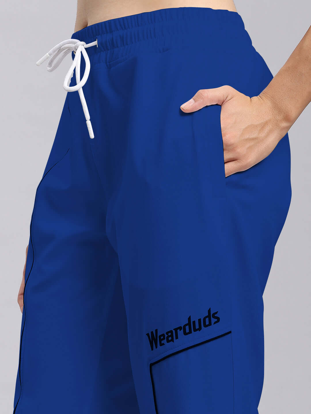 Women's Tokyo Relaxed Fit Joggers in Blue by DUDS, featuring customizable fit. Comfortable design crafted by skilled tailors.