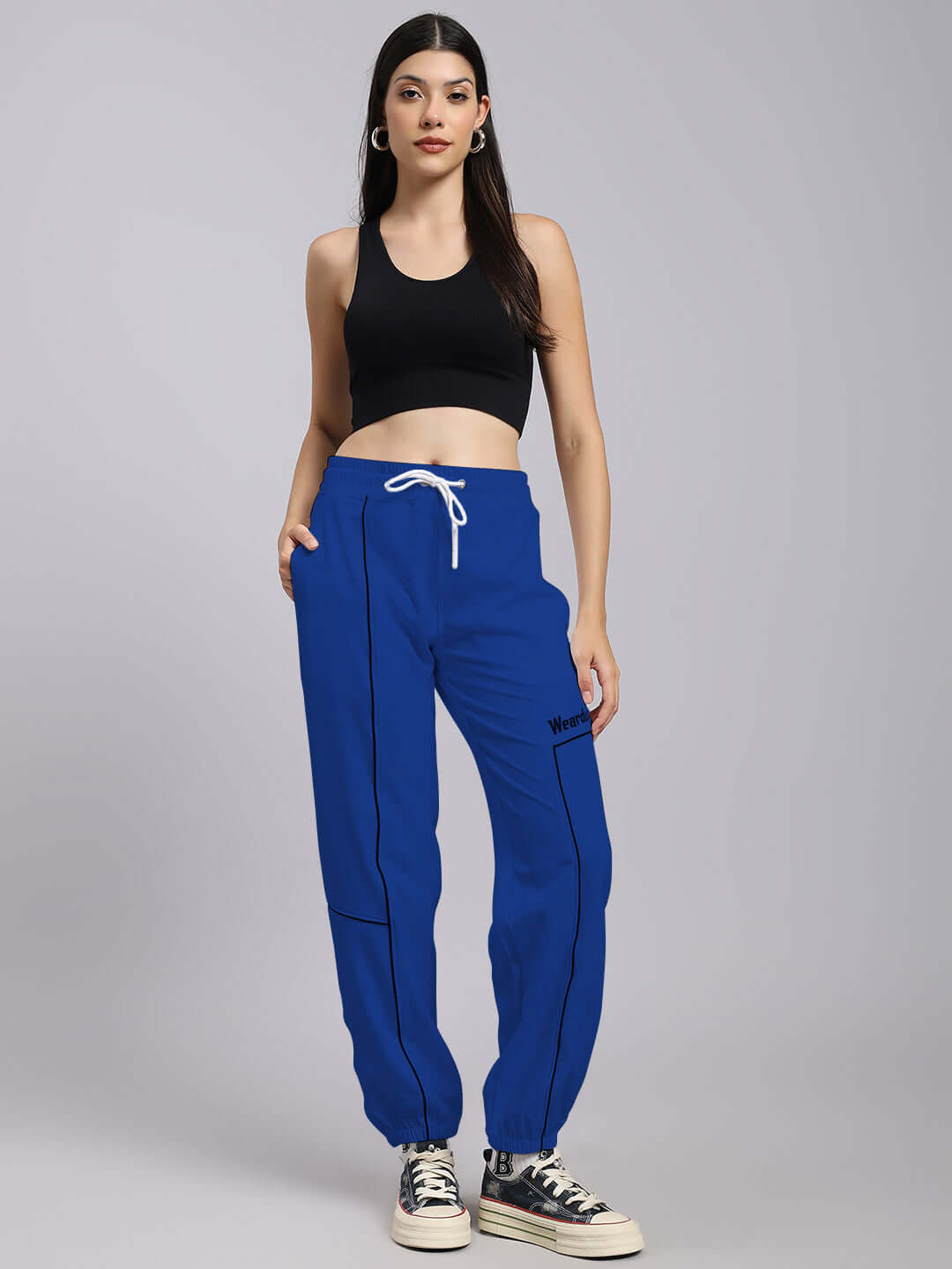 Model wearing Women's Tokyo Relaxed Fit Joggers in blue, showcasing stylish and comfortable design, perfect for casual wear.