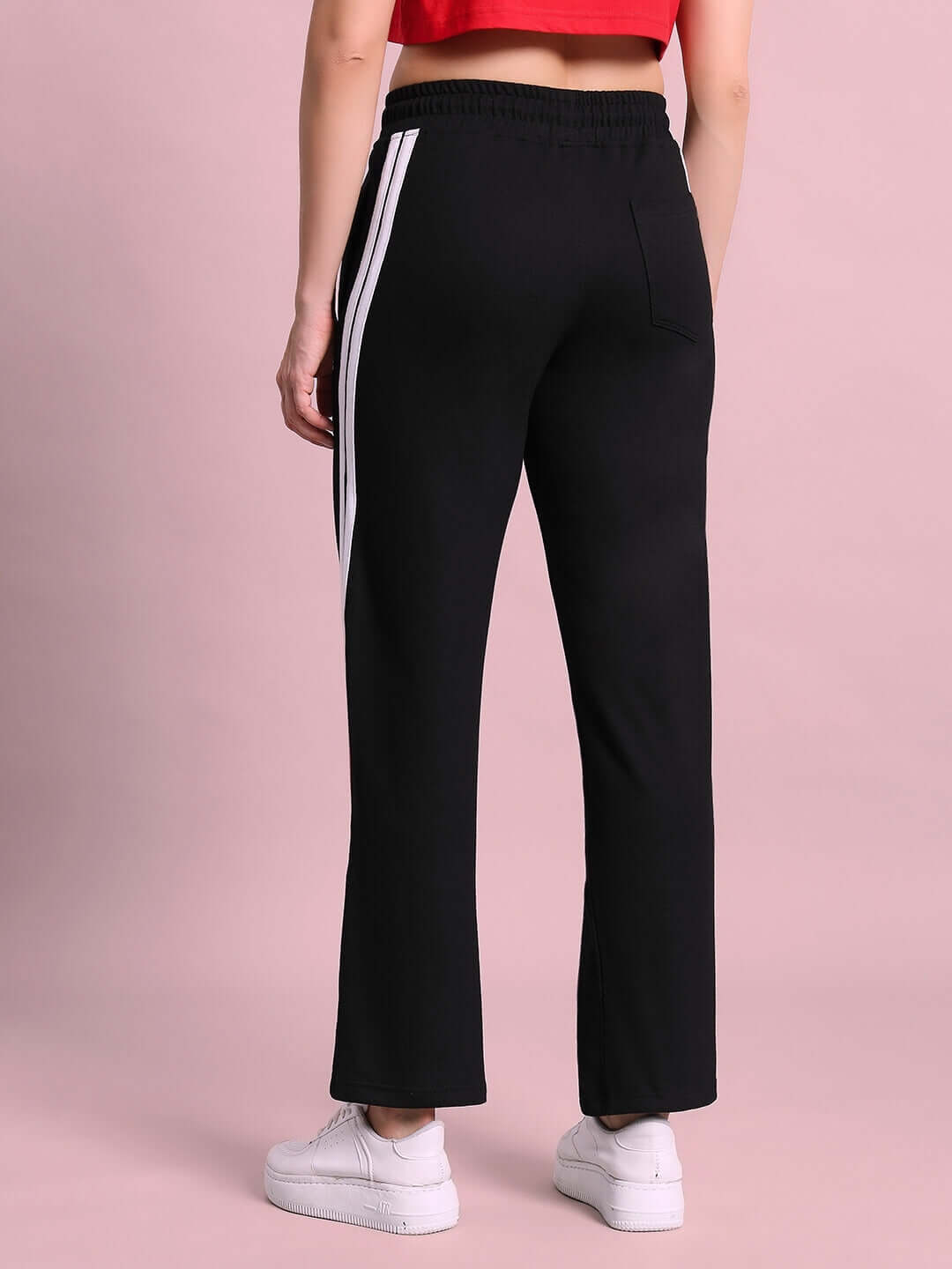 Back view of Women's Tornado Joggers in Black Red by DUDS, featuring side stripes and elastic waist, perfect for casual wear.