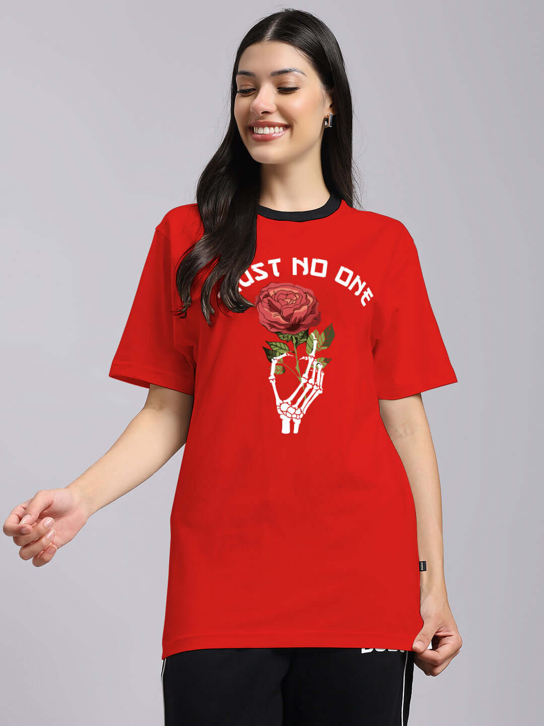 Red women's T-shirt with 'Trust No One' print and floral design, made of 100% cotton, model wearing medium size.