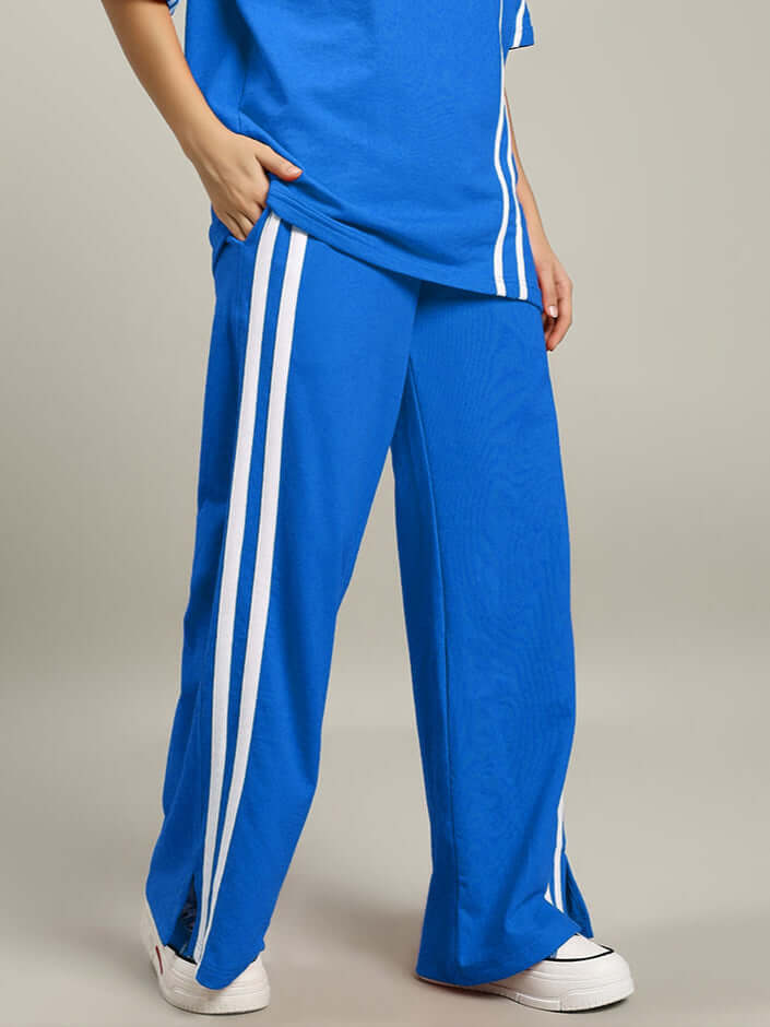 Women's United Stripe Joggers in Blue with white stripes, made to order by DUDS. Custom fit option available for prepaid orders.