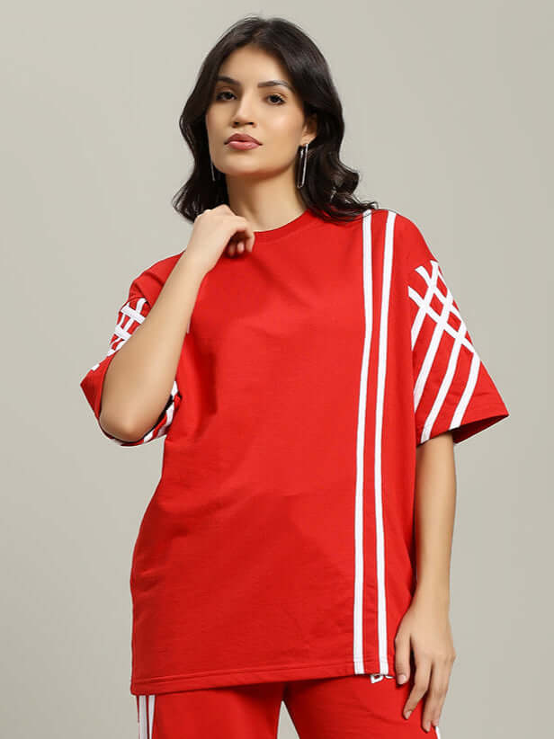 Women's red striped oversized t-shirt made of premium cotton blend fabric, featuring a stylish design for a casual, comfortable look.