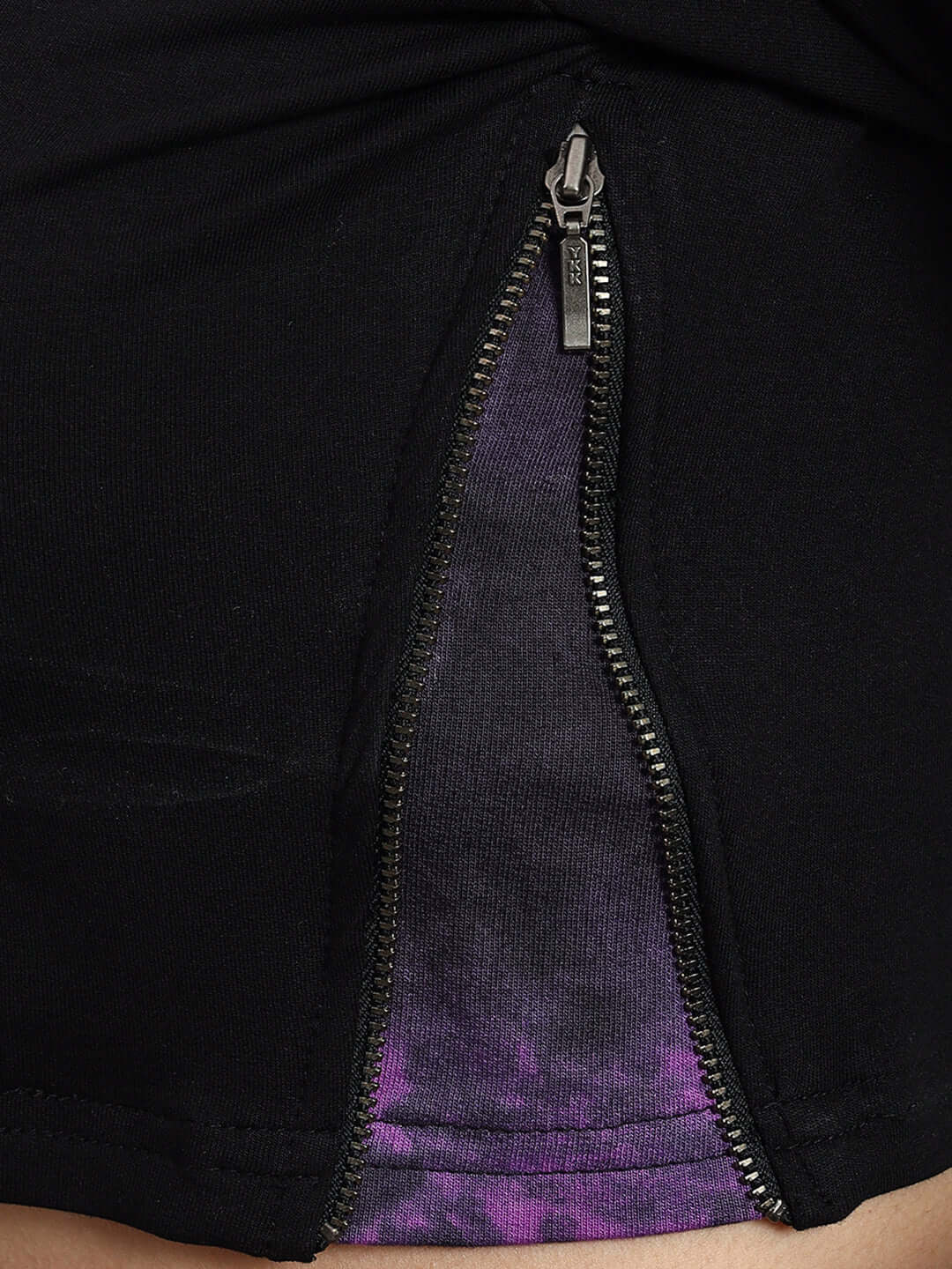Close-up of black-purple viola tie-dye crop top zipper detail, showcasing premium cotton lycra fabric.