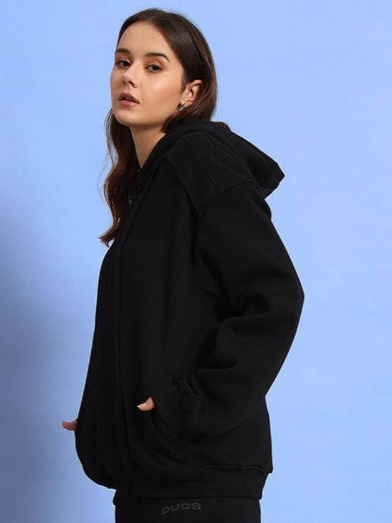 Woman wearing black WD Admire co-ord by DUDS, showcasing stylish custom-fit clothing, available in made-to-order options.