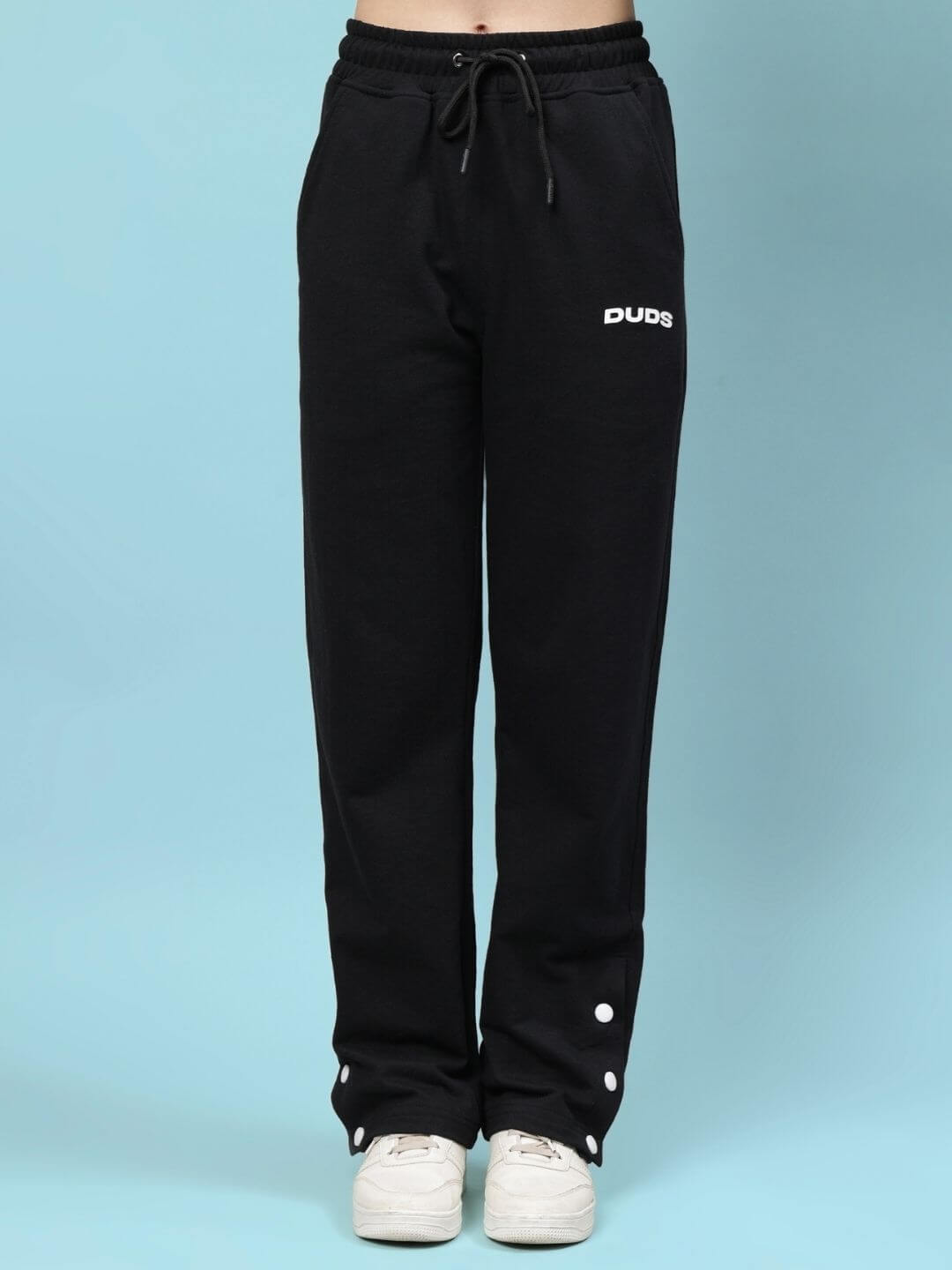 Woman wearing WOMEN'S WESENT RELAXED-FIT CO-ORD SET BLACK with comfortable fit, made from premium heavy gauge fabric and cotton elastane blend.