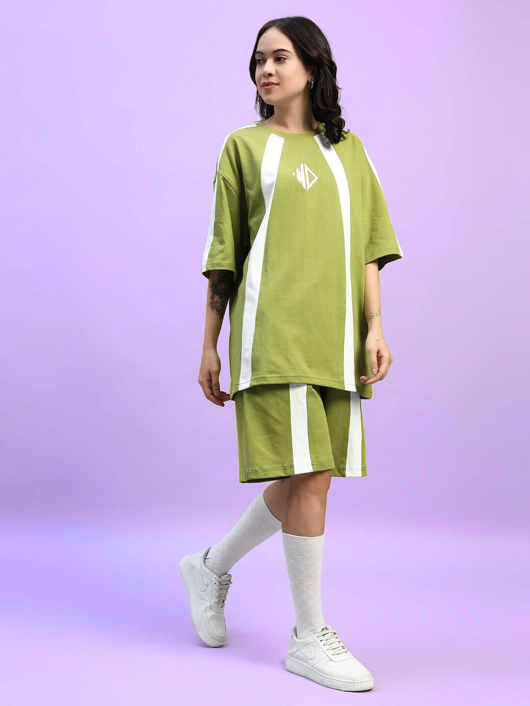 Model wearing WOMEN'S WIDELINE SUMMER CO-ORD SET OLIVE GREEN in premium cotton fabric