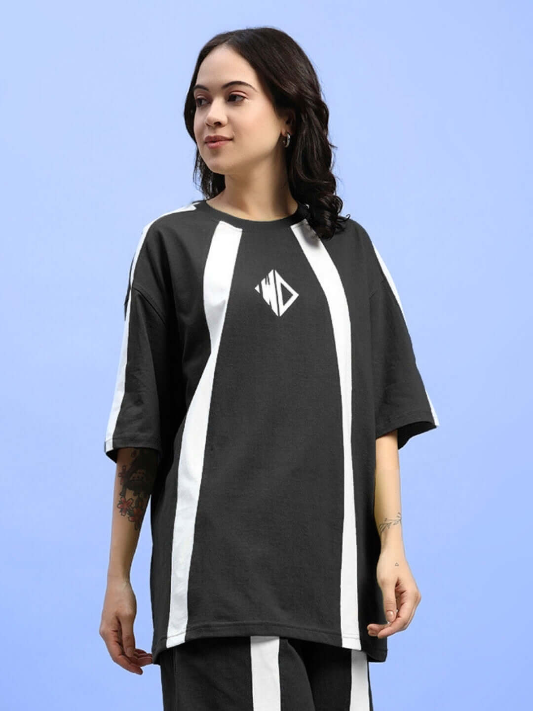 Women's oversized black T-shirt by Color By Colours, featuring premium cotton French terry fabric and bold white stripes.